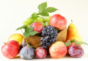 assortment autumn harvest fruit (grapes, figs, apples, plums)