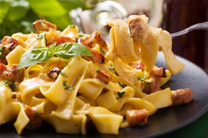 Pasta Carbonara with bacon, basil and cheese