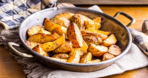 Potato. Roasted potatoes. American potatoes with salt pepper and cumin. Roasted potato wedges delicious crispy.