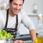 Man in kitchen preparing dinner
