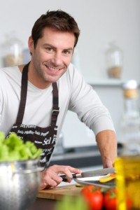 Man in kitchen preparing dinner