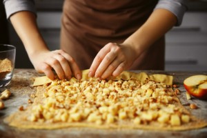 Woman cooking apple pie